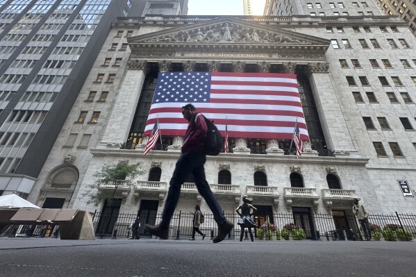 Stock market today: Wall Street rises to close its latest record-setting week as banks jump