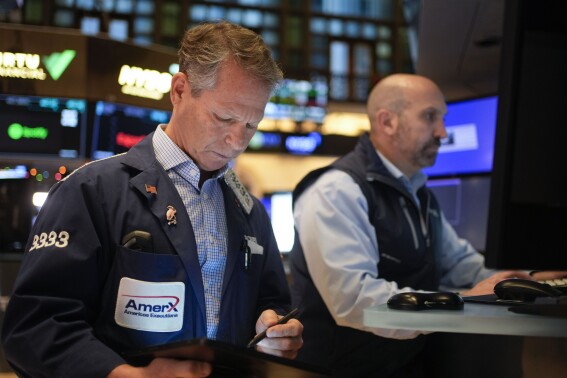 Stock market today: Asian shares slip after Wall St slumps despite strong US economic data